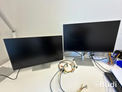 Office workstation with height-adjustable desk, Kinnarps chair, and 2 Dell monitors