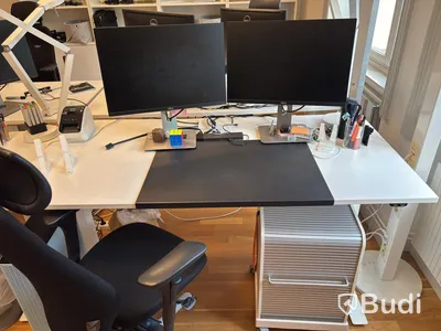 Office workstation with height-adjustable desk, Kinnarps chair, 2 Dell monitors and drawer unit