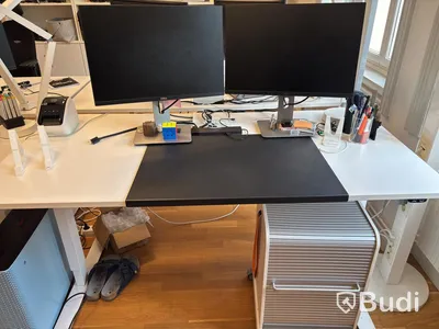 Office workstation with height-adjustable desk, Kinnarps chair, 2 Dell monitors and drawer unit
