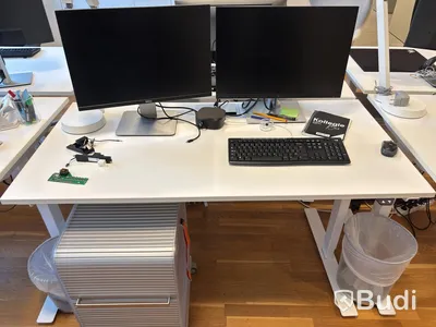 Workstation with height-adjustable desk, Kinnarps chair, 2 monitors and drawer unit
