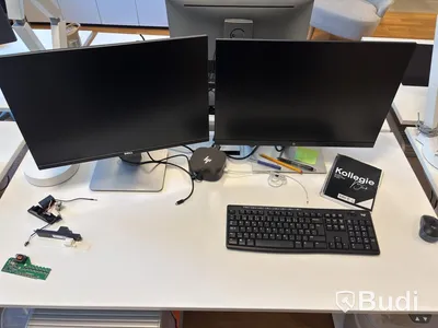 Workstation with height-adjustable desk, Kinnarps chair, 2 monitors and drawer unit