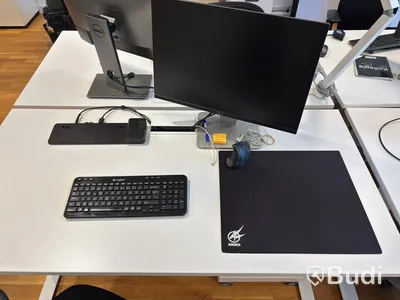 Office workstation with height-adjustable desk, Kinnarps chair, and 1 Dell monitor