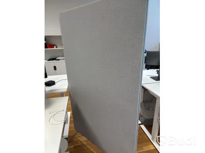 Office workstation with height-adjustable desk, Kinnarps chair, 2 Dell monitors, screen divider