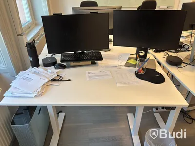 Office workstation with height-adjustable desk, Kinnarps chair and 2 Dell monitors