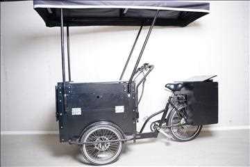 Elektrisk lådcykel med tak, Cargo Bike. Använts som glasskiosk.