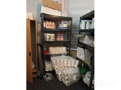 Lot of assorted cleaning supplies, incl. warehouse shelving and cabinets