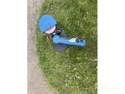 Mutterdragare och kedjeslip för motorsåg