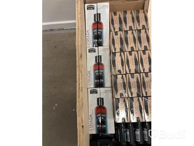 Lot of assorted hair products, perfumes, etc.