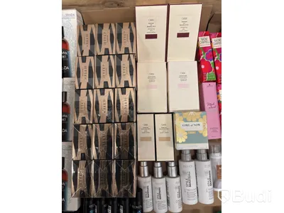 Lot of assorted hair products, perfumes, etc.