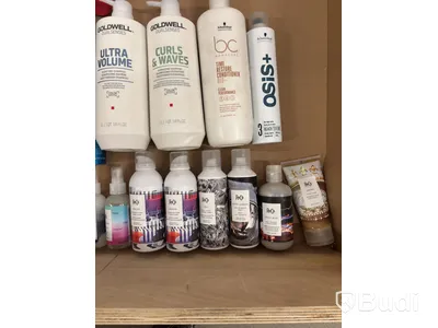 Lot of assorted hair products, perfumes, etc.