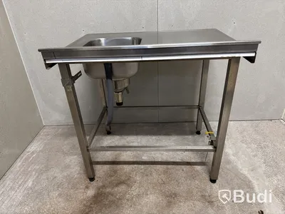 Diskbänk i rostfritt stål på arbetsbord