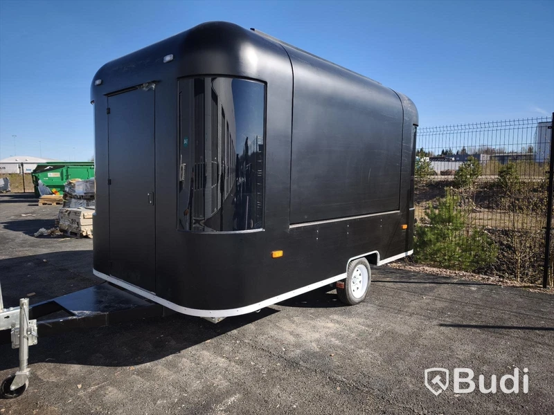 Unused food trailer with serving hatch, extractor fan and work surfaces