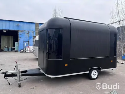 Unused food trailer with serving hatch, extractor fan and work surfaces