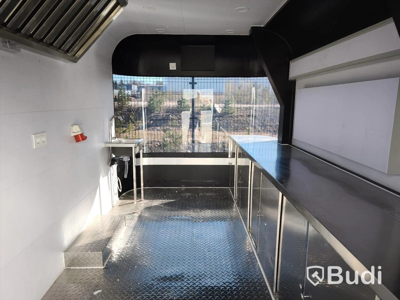 Unused food trailer with serving hatch, extractor fan and work surfaces