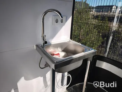 Unused food trailer with serving hatch, extractor fan and work surfaces