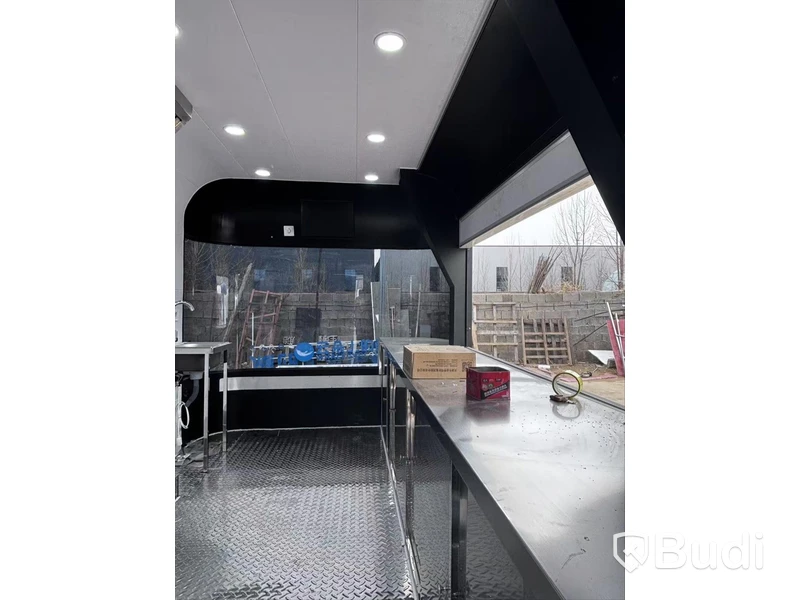 Unused food trailer with serving hatch, extractor fan and work surfaces