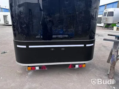 Unused food trailer with serving hatch, extractor fan and work surfaces