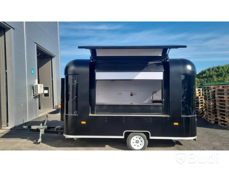 Unused food trailer with serving hatch, extractor fan and work surfaces
