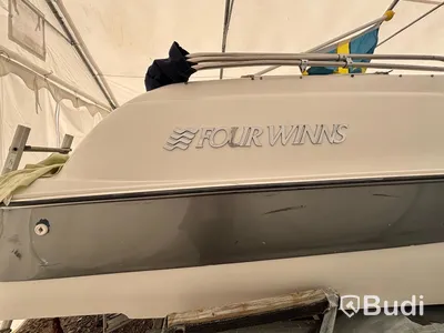 Motorbåt Fourwinns Sundowner 245 -1999 | Trailer & hamnkapell | 8,17 m