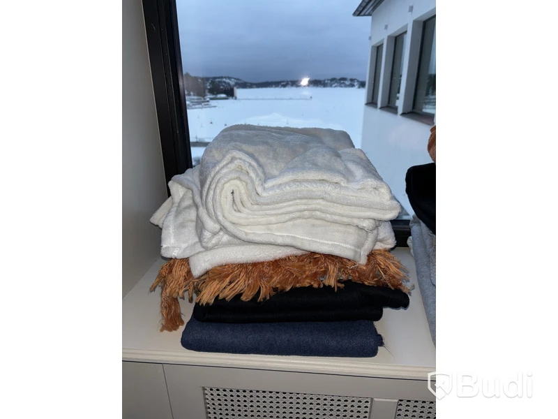 Parti med filtar, olika storlekar färg, och modeller