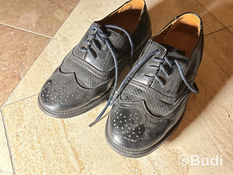 Skor Roma, stl. 32