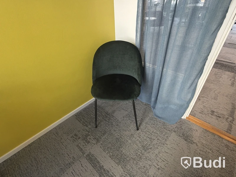 Chair with green velvet upholstery