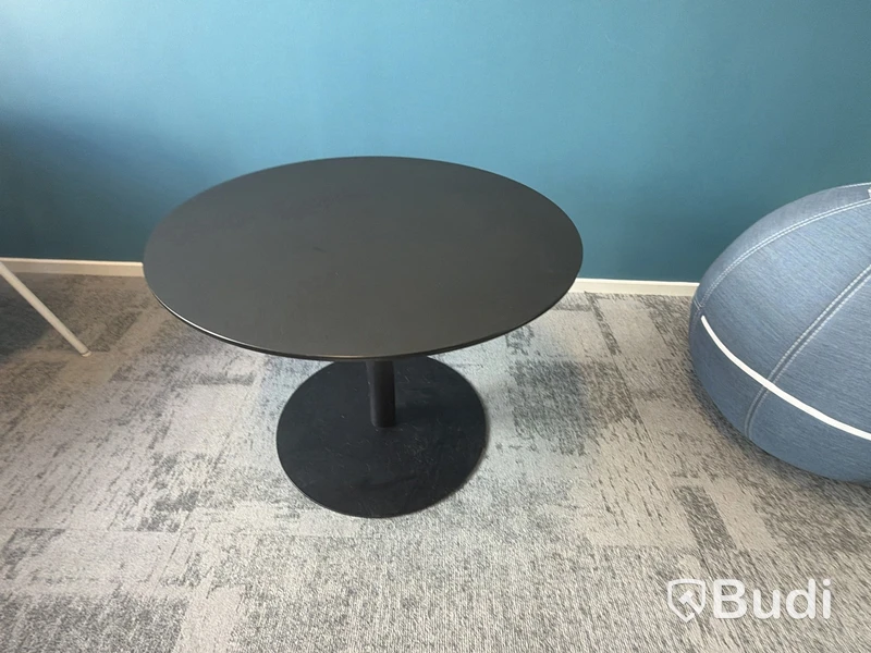 Black table with pedestal base