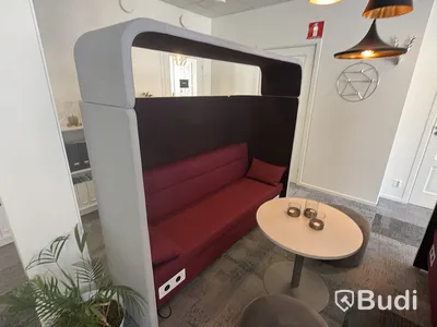 2 sound-dampening sofas with privacy screens, incl. 2 ottomans and a coffee table