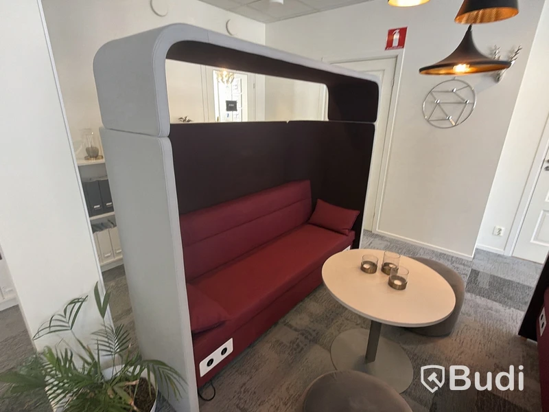 2 sound-dampening sofas with privacy screens, incl. 2 ottomans and a coffee table