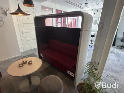 2 sound-dampening sofas with privacy screens, incl. 2 ottomans and a coffee table