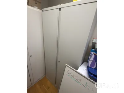2 metal storage cabinets with double doors