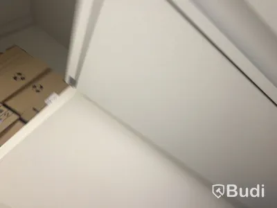 2 metal storage cabinets with double doors