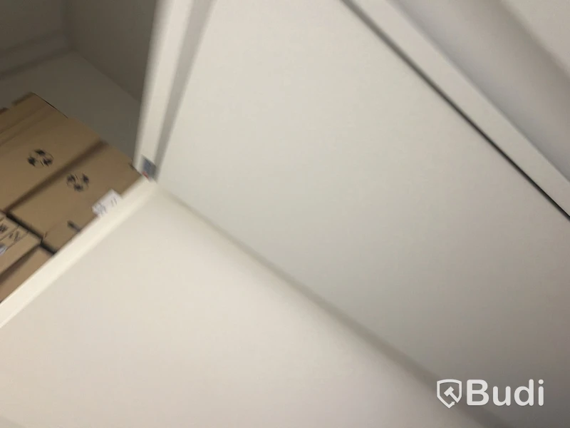 2 metal storage cabinets with double doors