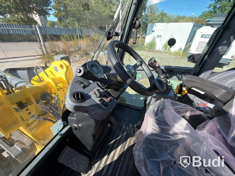 Wacker Neuson WL52 wheel loader, 2024 (248 hours), with plow and sand spreader