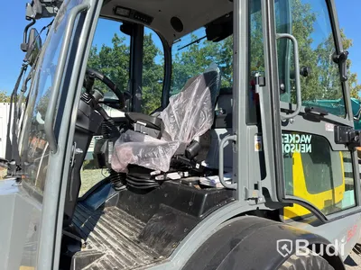 Wacker Neuson WL52 wheel loader, 2024 (248 hours), with plow and sand spreader