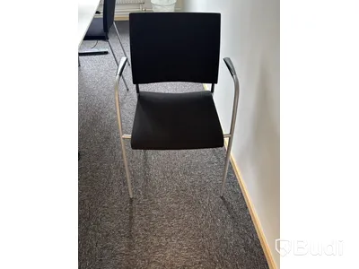 Conference table with 4 chairs and Philips 27-inch monitor