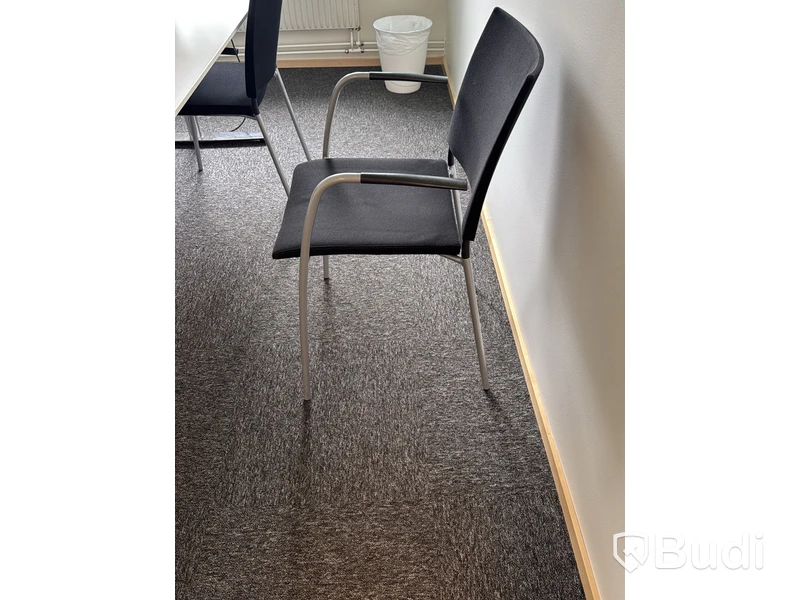 Conference table with 4 chairs and Philips 27-inch monitor