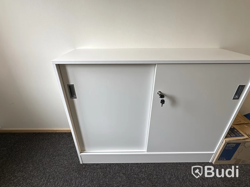 Storage cabinet with sliding doors
