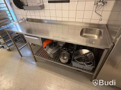Rostfri arbetsbänk med ho