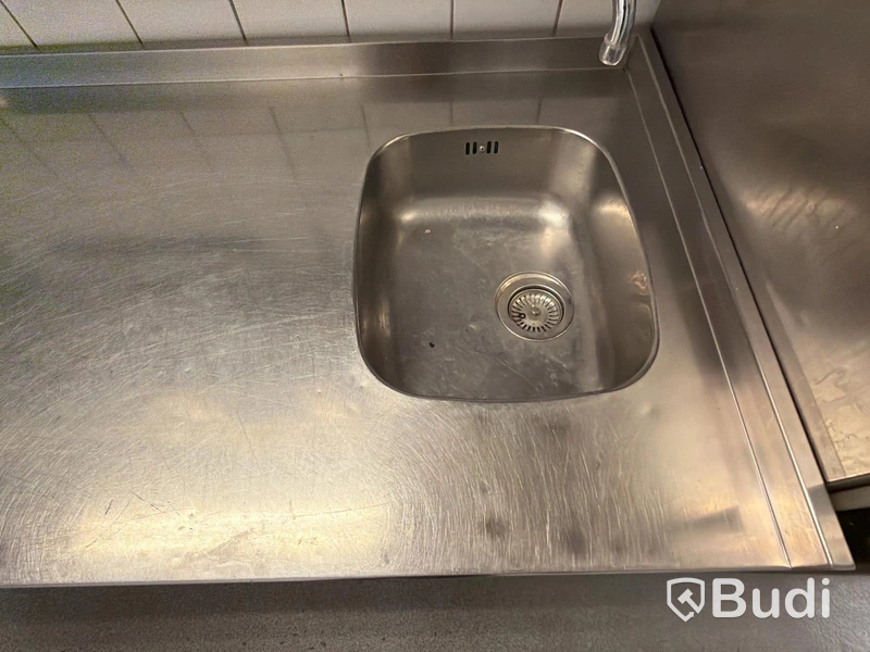 Rostfri arbetsbänk med ho