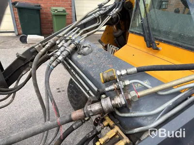 Wille 455B implement carrier, 2006, with sweeper roller