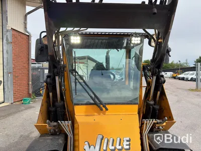 Wille 455B implement carrier, 2006, with sweeper roller