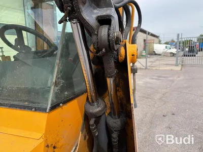 Wille 455B implement carrier, 2006, with sweeper roller