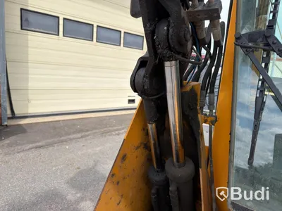 Wille 455B implement carrier, 2006, with sweeper roller