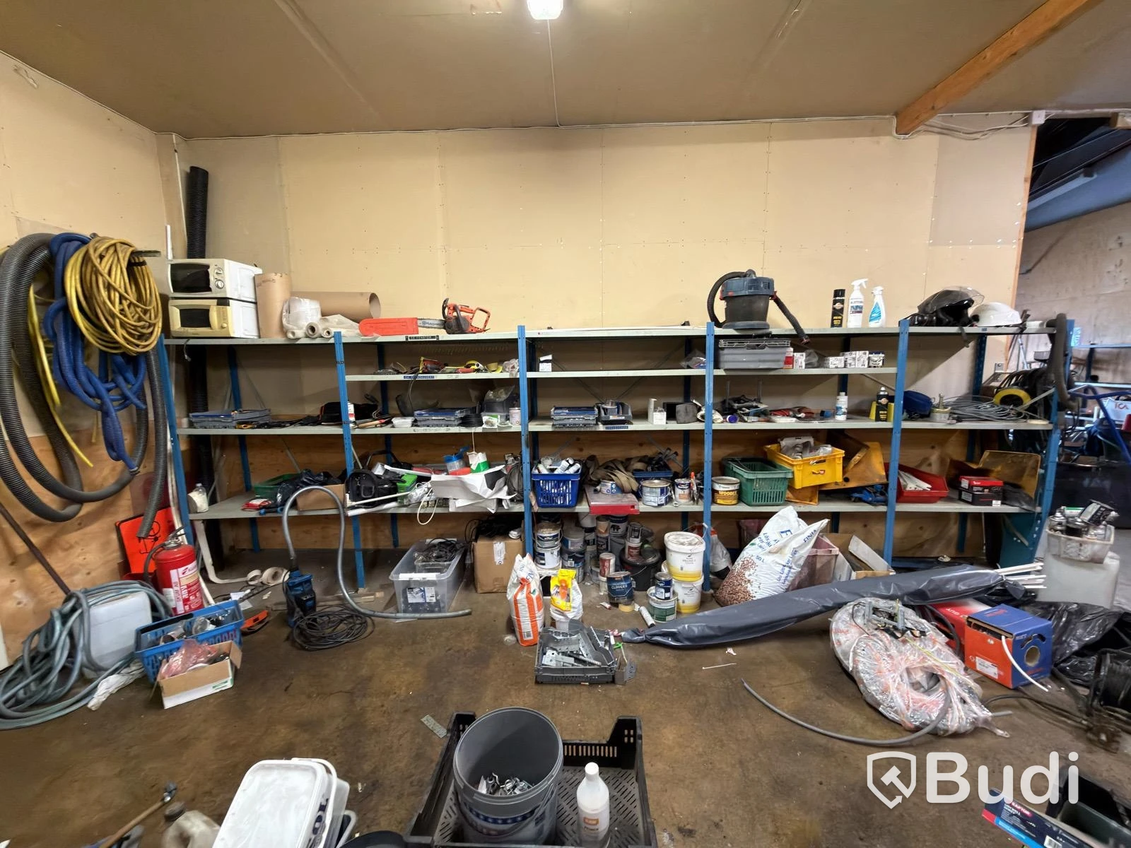 Metal shelving unit with contents