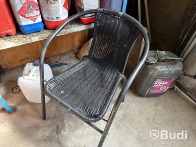 Metal shelving units with contents, ladders, etc.