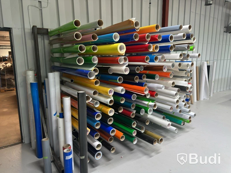 Rack with assorted rolls of material