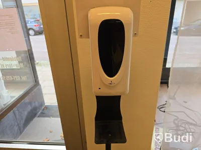 Entrématta och handspritdispenser