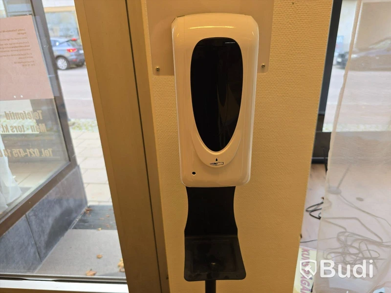 Entrématta och handspritdispenser