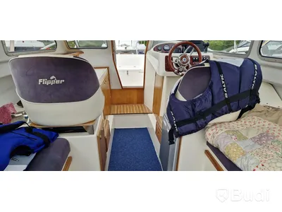 Flipper 630 OC with Yamaha 115 hp 4-stroke engine, 2002, with unbraked trailer
